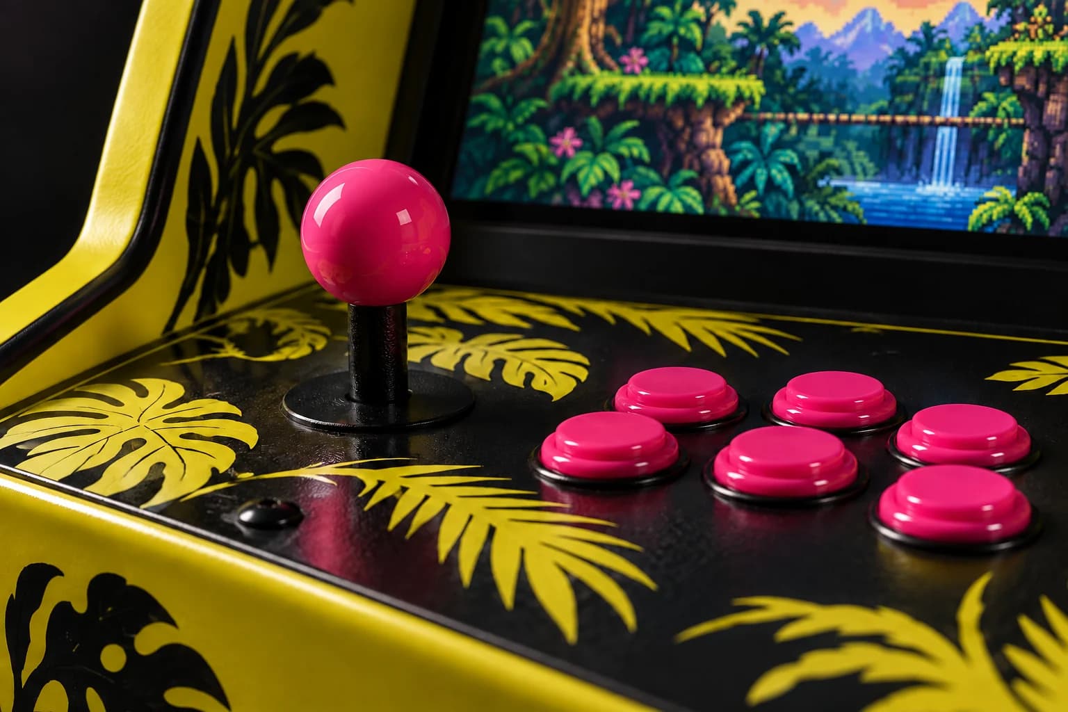 Pink arcade joystick and buttons on a yellow and black control deck